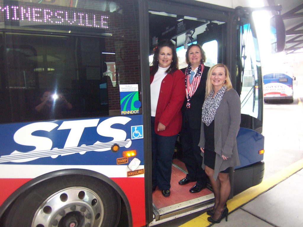 Welcoming veterans aboard the Minersville fixed route bus for their FREE ride in honor of Veterans Day are: (L) to (R): Joan Breslin, Marketing and Service Support Coordinator; Theresa Gaffney, Schuylkill County Register of Wills, 6 yrs US Army Reserve Service; Rhonda Lomas-O'Donnell, STS Human Resources Manager